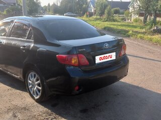 2008 Toyota Corolla X (E140, E150), чёрный, 560000 рублей, вид 4