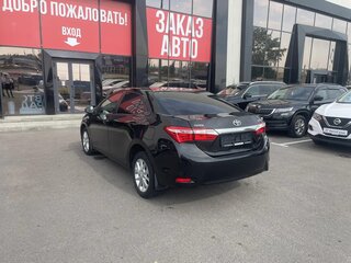 2014 Toyota Corolla XI (E160, E170, E180), чёрный, 1180000 рублей, вид 4
