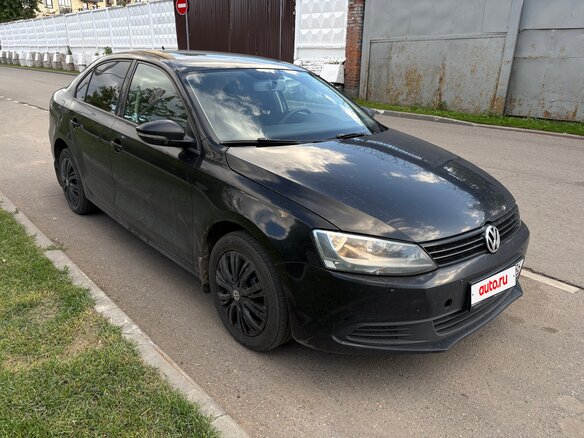 2012 Volkswagen Jetta VI, чёрный - вид 1