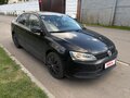 2012 Volkswagen Jetta VI, чёрный - вид 1
