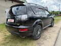 2011 Mitsubishi Outlander II Рестайлинг, чёрный, 950000 рублей - вид 5