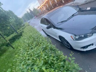 2010 Mitsubishi Lancer X, белый, 690000 рублей, вид 3