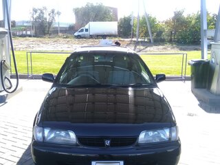 1998 Toyota Corolla II V (L50), чёрный, 400000 рублей, вид 1
