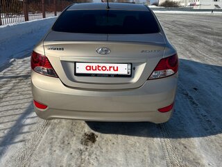 2011 Hyundai Solaris I, золотистый, 630000 рублей, вид 2