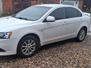2012 Mitsubishi Lancer X Рестайлинг, белый, 615000 рублей, вид 1