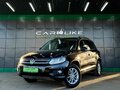 2014 Volkswagen Tiguan I Рестайлинг, чёрный, 1749000 рублей - вид 1