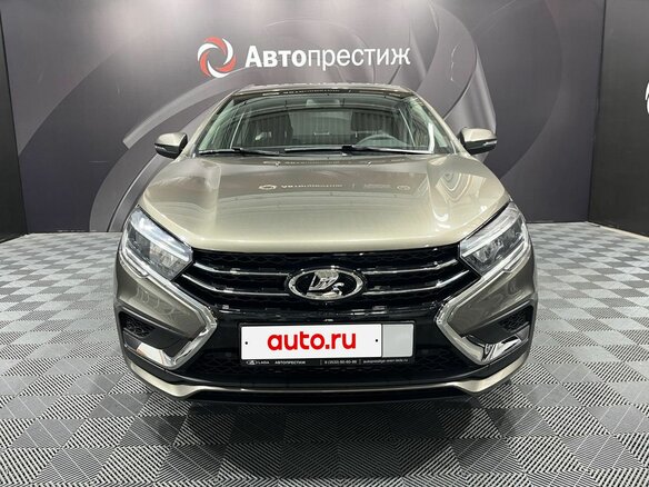 2026 Lada (ВАЗ) Vesta I Рестайлинг (NG), коричневый, 1880000 рублей - вид 1