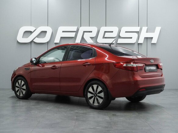 2013 Kia Rio 4-speed III, красный - вид 1