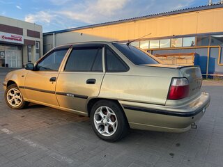 2007 Daewoo Nexia I, жёлтый, 230000 рублей, вид 4
