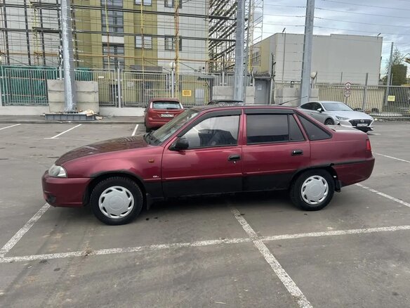 2012 Daewoo Nexia I Рестайлинг, пурпурный, 110000 рублей - вид 3
