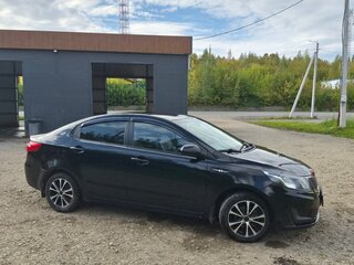 2014 Kia Rio III, чёрный, 850000 рублей, вид 1