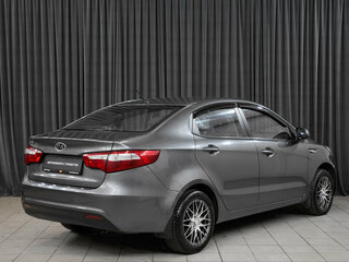 2012 Kia Rio 5-speed III, серый, 700000 рублей, вид 4