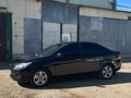 2010 Ford Focus II Рестайлинг, чёрный - вид 3