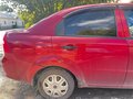 2009 Chevrolet Aveo I Рестайлинг, красный, 350000 рублей - вид 3