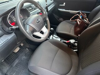 2014 Kia Rio 4-speed III, серебристый, 1150000 рублей, вид 3