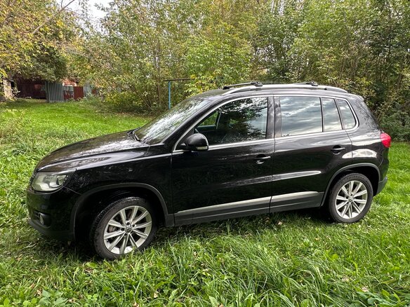 2011 Volkswagen Tiguan I Рестайлинг, чёрный, 1250000 рублей - вид 4