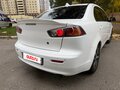 2011 Mitsubishi Lancer X Рестайлинг, белый, 750000 рублей - вид 8