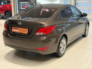 2016 Hyundai Solaris I Рестайлинг, коричневый, 799000 рублей, вид 4