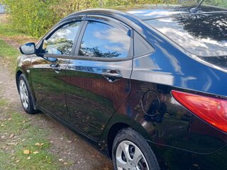 2013 Hyundai Solaris I, чёрный, 850000 рублей, вид 3