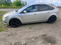 2010 Ford Focus II Рестайлинг, серебристый, 530000 рублей - вид 4