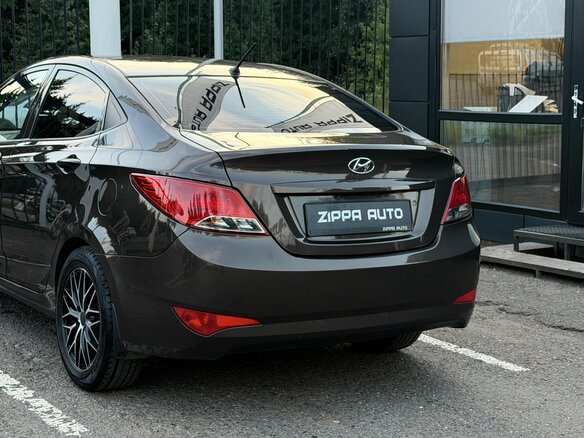 2014 Hyundai Solaris I Рестайлинг, коричневый - вид 6
