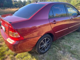 2005 Toyota Corolla IX (E120, E130) Рестайлинг, пурпурный, 450000 рублей, вид 3