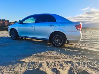 2009 Toyota Corolla Axio X (E140, E150) Рестайлинг, серый, 540000 рублей, вид 4