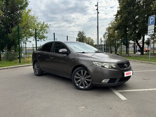 2009 Kia Cerato 5-speed II, золотистый, 750000 рублей, вид 1