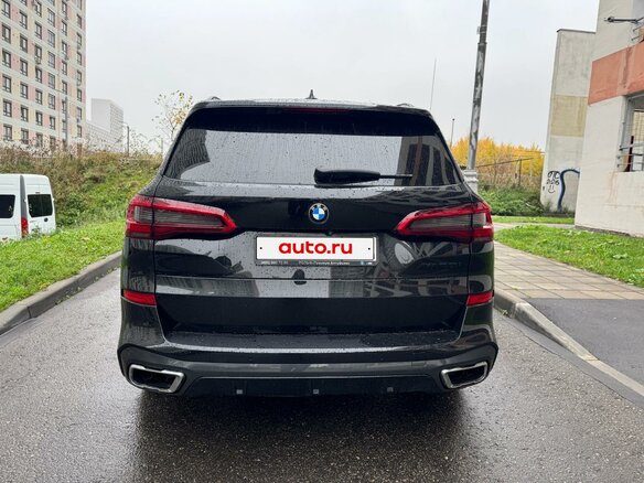 2018 BMW X5 50i IV (G05/G18), чёрный, 6600000 рублей - вид 4