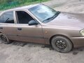 2004 Hyundai Accent ТагАЗ II, коричневый - вид 2