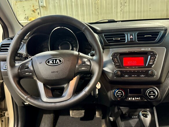 2012 Kia Rio 4-speed III, бежевый - вид 21