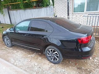 2017 Volkswagen Jetta VI Рестайлинг, чёрный, 1600000 рублей, вид 4