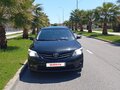 2010 Toyota Corolla X (E140, E150) Рестайлинг, чёрный, 1100000 рублей - вид 4