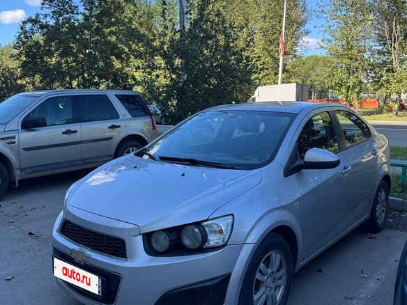 2012 Chevrolet Aveo II, серебристый, 730000 рублей