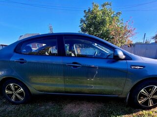 2012 Kia Rio 5-speed III, голубой, 730000 рублей, вид 5