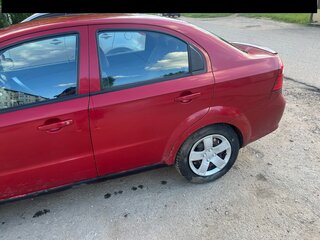 2011 Chevrolet Aveo I Рестайлинг, красный, 550000 рублей, вид 3
