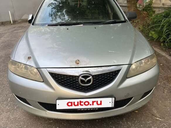 2004 Mazda Atenza I, серебристый - вид 1