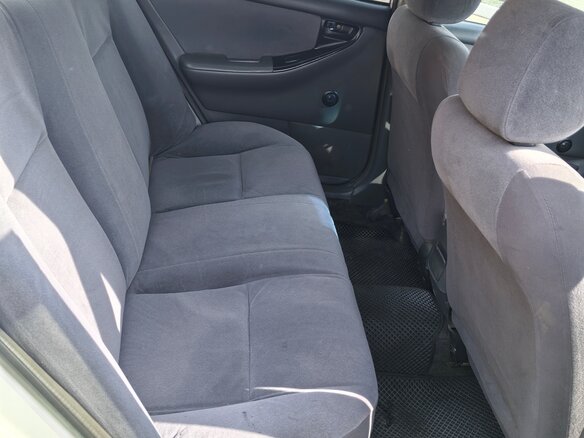2004 Toyota Corolla IX (E120, E130), белый, 500000 рублей - вид 8