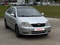 2002 Toyota Corolla IX (E120, E130), серый - вид 2
