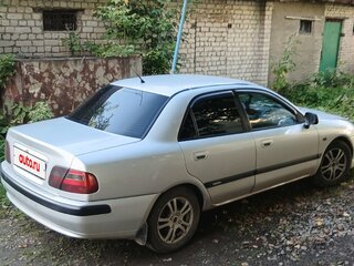 2001 Mitsubishi Carisma I Рестайлинг, серебристый, 280000 рублей, вид 2