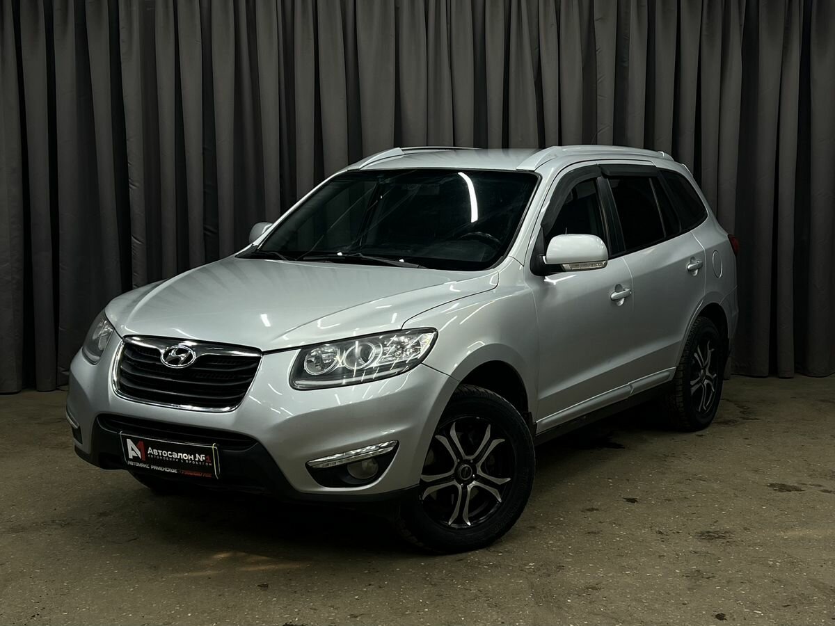 Открыть фотографии: Hyundai Santa Fe II Рестайлинг