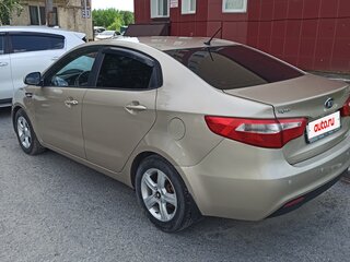 2014 Kia Rio 6-speed III, бежевый, 650000 рублей, вид 4