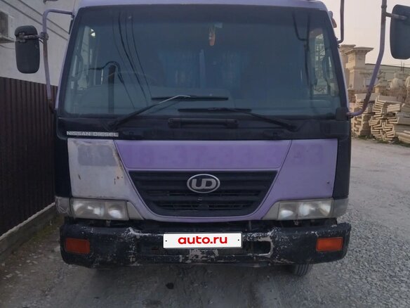 2003 Nissan Diesel Condor, фиолетовый, 3950000 рублей - вид 1