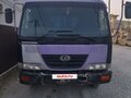 2003 Nissan Diesel Condor, фиолетовый, 3950000 рублей - вид 1