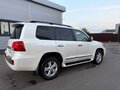 2012 Toyota Land Cruiser 200 Series Рестайлинг 1, белый - вид 3