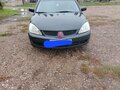 2007 Mitsubishi Lancer IX Рестайлинг, чёрный, 400000 рублей - вид 1