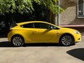 2014 Opel Astra GTC J Рестайлинг, жёлтый - вид 10