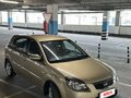 2010 Kia Rio II Рестайлинг, золотистый, 595000 рублей - вид 2