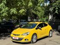 2014 Opel Astra GTC J Рестайлинг, жёлтый