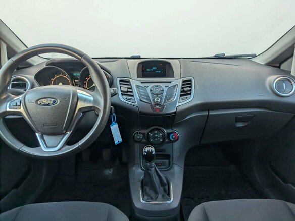 2015 Ford Fiesta Mk6 Рестайлинг, серебристый, 709000 рублей - вид 8